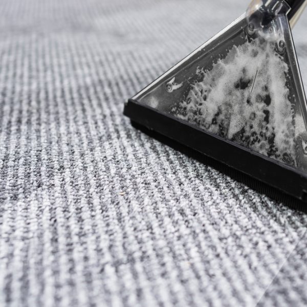 Photo,Of,Janitor,Cleaning,Carpet,With,Vacuum,Cleaner