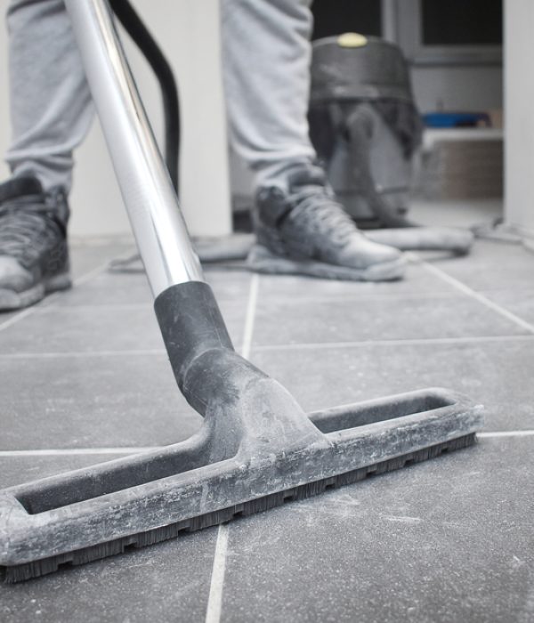 After,Builders,Cleaning,With,Vacuum,Cleaner,And,Copy,Space